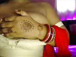 Hot desi girl massaged her breasts and pressed her breasts and sucked the nipples in her mouth.