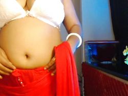 Sexy desi girl shows her hot and big boobs wearing a bra.